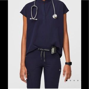 Selling Navy blue figs scrubs!